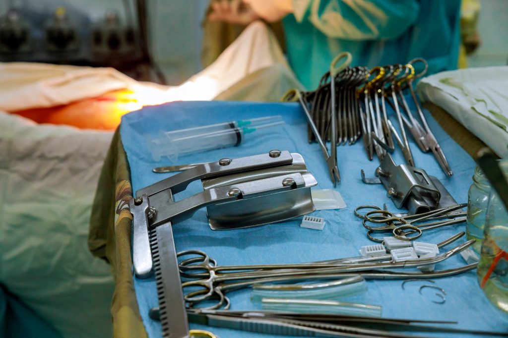 Surgical instruments in operating room with medical equipment